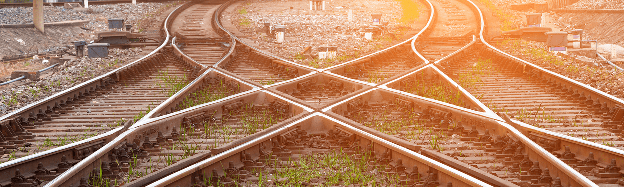 a picture of the intersection of a railway line (railway lines crossing over one another)