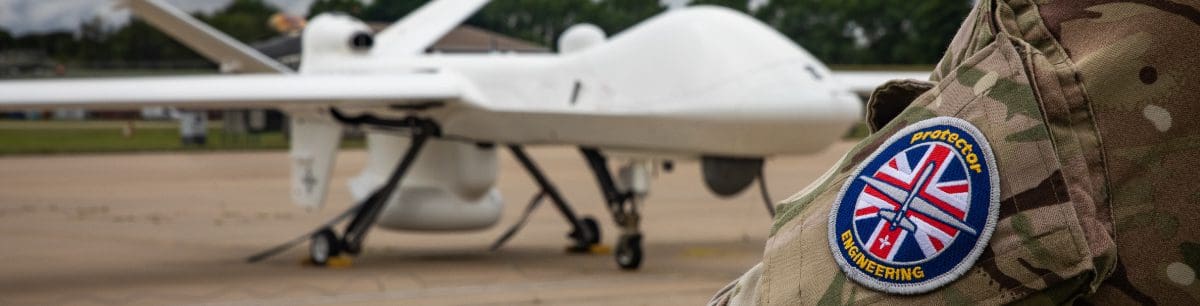 an image of an armed forces badge with a drone in the background
