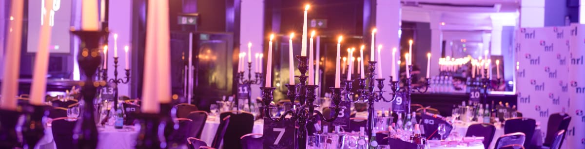 NRL Christmas Conference 2023 room in Manchester, showing event setup and decorations.