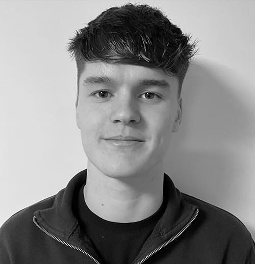 Black-and-white headshot of Toby Gregory.